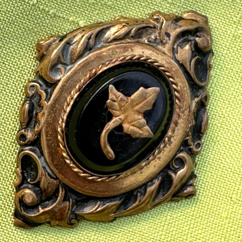 Vintage Baroque Repousse Metalwork Brooch Pin With Black Stone and Leaf Motif